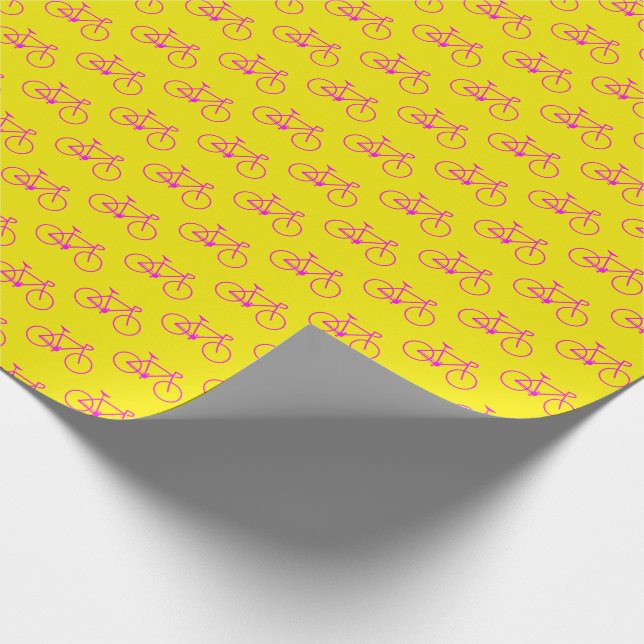 Lots of Magenta Bicycle Shapes on Yellow Wrapping Paper (Corner)