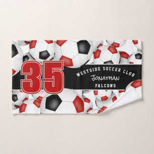 Lots of red black team colours soccer balls  hand towel