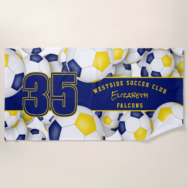 Lots of soccer balls blue gold end of season gifts beach towel (Front)