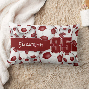 Lots of soccer balls maroon team colours decor lumbar cushion