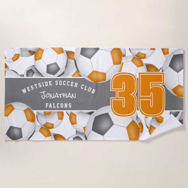 Lots of soccer balls orange grey team colours beach towel (Front)