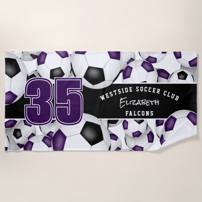 Lots of soccer balls purple black team colours beach towel (Front)