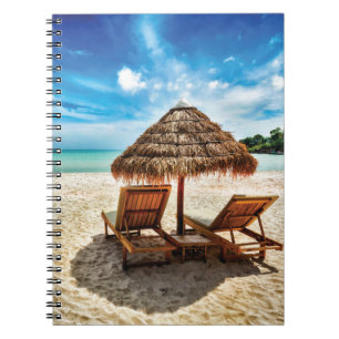 Lounge chairs on beach throw pillow notebook