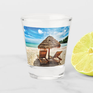 Lounge chairs on beach throw pillow shot glass