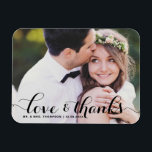 Love and Thanks | Black Calligraphy Photo Wedding Magnet<br><div class="desc">Celebrate your love and show gratitude with our customisable photo wedding thank you magnet! This unique keepsake is perfect for reminding your loved ones of your special day while expressing your heartfelt thanks in a memorable way. It features a modern typography photo overlay. Personalise by adding your photo and details....</div>
