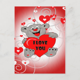 Love couplles Teddy bear holding a heart Postcard