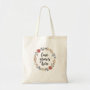 "Love Grows Here" with Floral Wreath Tote Bag