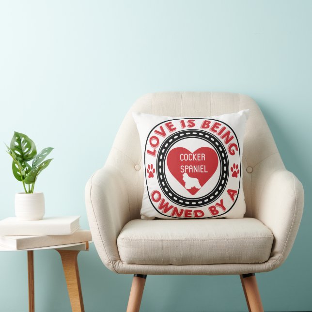 Love is being owned by a Cocker Spaniel  Cushion (Chair)