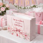 Love is in Bloom pink bow floral Bridal Shower Large Gift Bag<br><div class="desc">Blush pink background decorated with a pink coloured bow and pink roses,  flowers. Personalise and add a name
Text: Love is in Bloom</div>