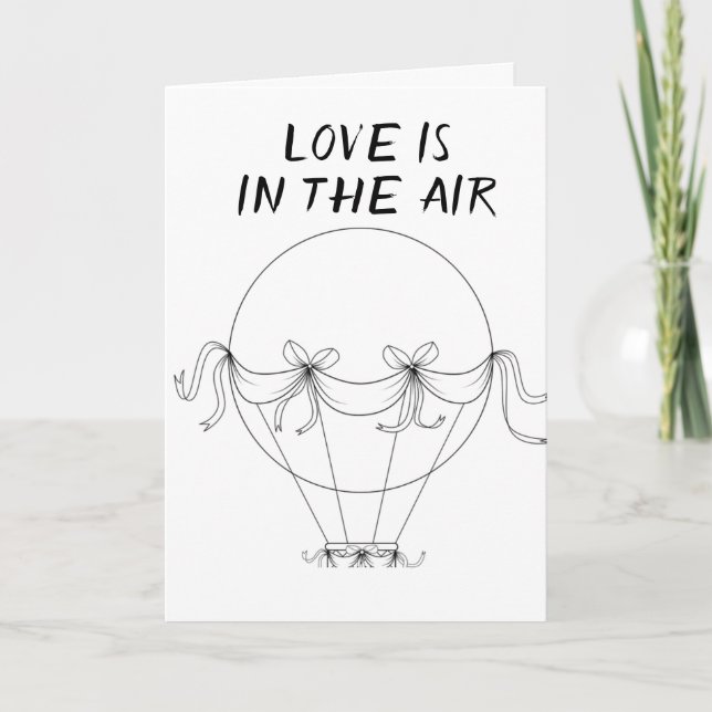 **LOVE** IS IN THE AIR **ON OUR ANNIVERSARY** CARD (Front)