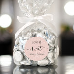 Love Is Sweet Blush Pink Wedding Favour Classic Round Sticker<br><div class="desc">Chic blush pink sticker for your wedding reception dessert and candy favours featuring "Love Is Sweet" in simple modern typography and an elegant calligraphy script with swashes,  your first names joined together by a heart and your wedding date.</div>