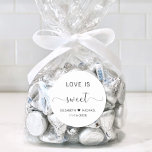 Love Is Sweet Wedding Thank You Classic Round Sticker<br><div class="desc">Elegant thank you sticker for your wedding reception favours featuring "Love Is Sweet" in simple modern typography and a stylish elegant script with swashes,  your first names joined together by a heart and your wedding date.</div>