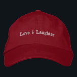 Love & Laughter Custom Text Charming Stylish Hat<br><div class="desc">Introducing the "Love & Laughter" Hat,  a charming and stylish accessory designed to celebrate the joyous union of love. 

Hat Colour: Red

You can customise the design.</div>