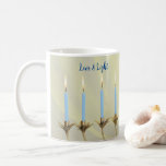 Love & Light  Blue Candles Gold Menorah Coffee Mug<br><div class="desc">Dive into the spirit of the Festival of Lights with our Hanukkah Love and Light Menorah Mug. This enchanting mug seamlessly combines tradition with modern elegance,  making it the perfect companion for your Hanukkah festivities.

You may personalise.</div>
