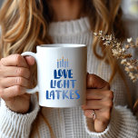 Love Light Lakes | Modern Whimsical Hanukkah  Coffee Mug<br><div class="desc">Discover a playful,  modern,  and vibrant Hanukkah Latkes Mug with double-sided printing. It features a minimalist menorah motif in blue and yellow,  complemented by whimsical blue lettering. The mug comes in a 15 oz. capacity,  with an alternative 11 oz. size available. It is both microwave and dishwasher safe.</div>