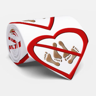 Love making feet in a heart shaped forbidden sign tie