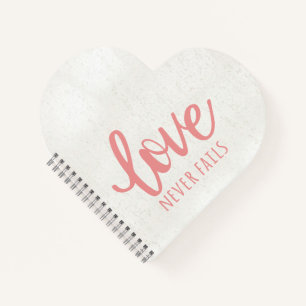 Love Never Fails - 1 Corinthians 13:8 Pink Notebook