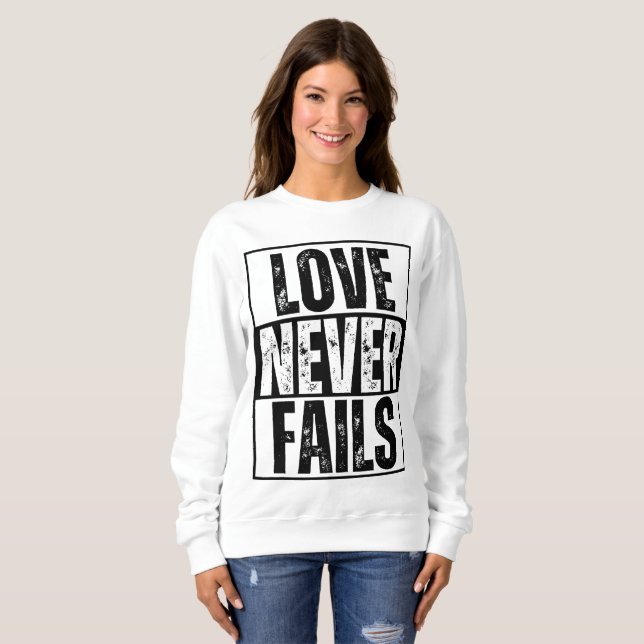 LOVE NEVER FAILS  SWEATSHIRT (Front Full)