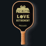 Love Retirement Monogram Name Court   Pickleball Paddle<br><div class="desc">Pickleball Guy certainly deserves a pickleball paddle that tells the story -- he's retired and loving life / and pickleball. His initials / monogram on the paddles and his name on the bottom. Gold and Black -- unique and classic. For yourself or makes a wonderful retirement gift. Any design questions,...</div>