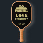 Love Retirement Monogram Name Court   Pickleball Paddle<br><div class="desc">Pickleball Guy certainly deserves a pickleball paddle that tells the story -- he's retired and loving life / and pickleball. His initials / monogram on the paddles and his name on the bottom. Gold and Black -- unique and classic. For yourself or makes a wonderful retirement gift. Any design questions,...</div>