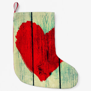 Love symbol on old wooden wall small christmas stocking