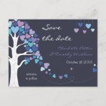 Love Tree Hearts Winter Wedding Save the Date Announcement Postcard<br><div class="desc">A wonderfully romantic and sweet wedding invitation with a tree which leaves are in the shape of hearts in blue,  purple and violet and a few of those leaves being swept away by a mild breeze against a dark matte blue background. Lovely for a winter wedding!</div>