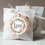 Love Whimsical Blush Coral Floral Wreath Wedding Classic Round Sticker<br><div class="desc">Wedding favour sticker features "Love" script text framed by a wreath of whimsical summer or fall flowers with a colourful floral watercolor design of flowers,  leaves,  and greenery in shades of blush pink,  golden yellow,  coral,  orange red,  violet purple,  and green.</div>