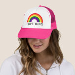 Love Wins Rainbow Colours LGBTQ Pride Month Trucker Hat<br><div class="desc">Celebrate Pride Month and show your support for the LGBTQ community with this colourful "LOVE WINS" trucker hat design (pink hat can be modified) with black modern text and a vibrant arched ROYGBV rainbow spectrum of colours.</div>