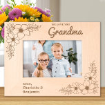 Love you Grandma Floral Personalised Wood Picture Etched Frames<br><div class="desc">Cherish Every Moment with Grandma Introducing the Personalised Etched Wood Frame, a beautiful way to celebrate the special bond between grandchildren and their beloved grandma. This exquisite wooden picture frame is adorned with delicate floral designs etched into each corner, creating a charming and timeless aesthetic that complements any photo. Features...</div>