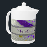 Love You Grandma Modern Paint Splatter Abstract<br><div class="desc">This personalised teapot offers grandma a vibrant design to wake her up in the morning or add a splash of colour to her afternoon tea. This artistic teapot features purple and yellow paint splatters against a silver background. A grey banner across the centre provides a solid background for "We Love...</div>