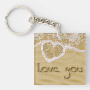 "Love you" written in sand - Acrylic Keychain