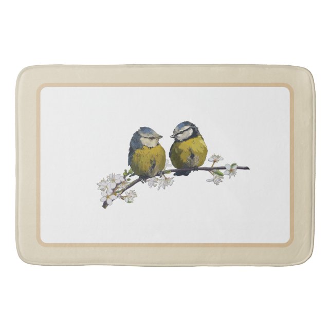 Lovebirds sitting on a cherry blossom branch beige bath mat (Front)