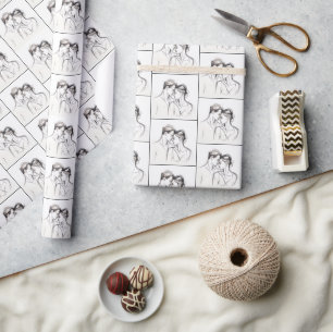 Lovers Sketching On White Wrapping Paper