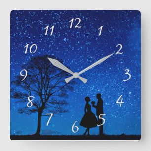 Lovers under a full moon square wall clock