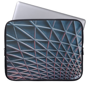 Low-angle photo of building structure laptop sleeve