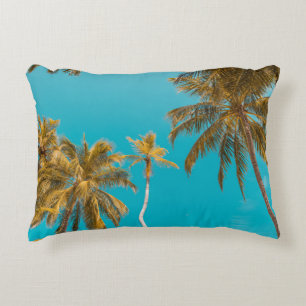 Low-angle photo of coconut trees decorative cushion