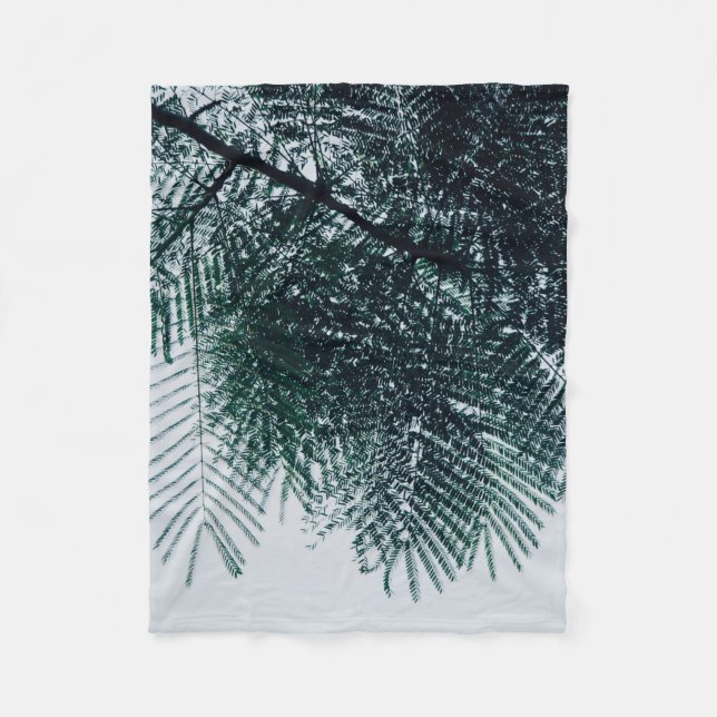 Low-angle photo of green tree fleece blanket (Front)