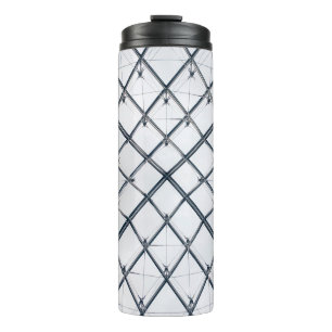 Low-angle photo of grey metal frame thermal tumbler