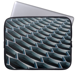 Low-angle photo of high-rise building laptop sleeve