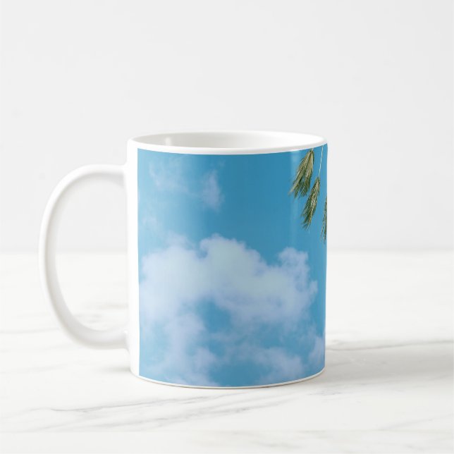 Low-angle photo of palm trees under blue sky coffee mug (Left)