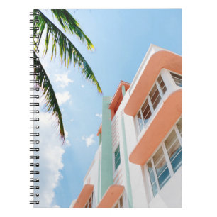 Low angle photo of white and orange concrete build notebook