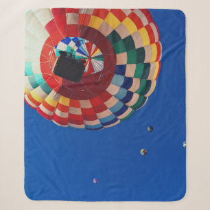 Low angle photography of balloons sherpa blanket