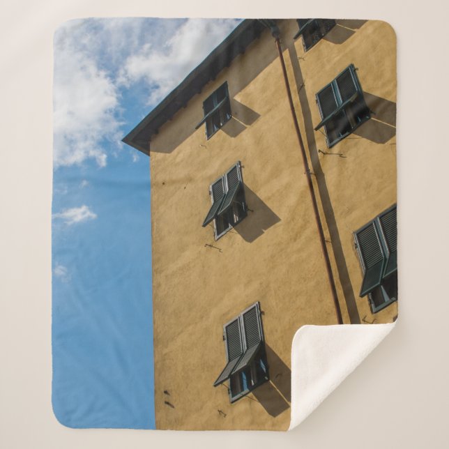 LOW ANGLE PHOTOGRAPHY OF BROWN LOUVER WINDOW SHERPA BLANKET (Front)