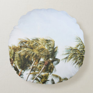 LOW-ANGLE PHOTOGRAPHY OF GREEN COCONUT TREES UNDER ROUND CUSHION