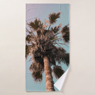 Low-angle photography of palm plant bath towel