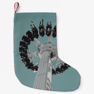 Low-angle photography of people riding a drop-down small christmas stocking