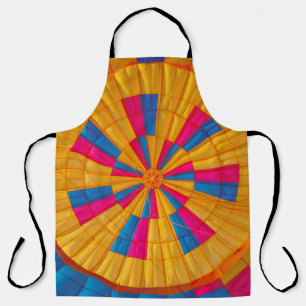 Low angle photography of yellow, pink, and black h apron