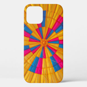 Low angle photography of yellow, pink, and black h iPhone 12 case