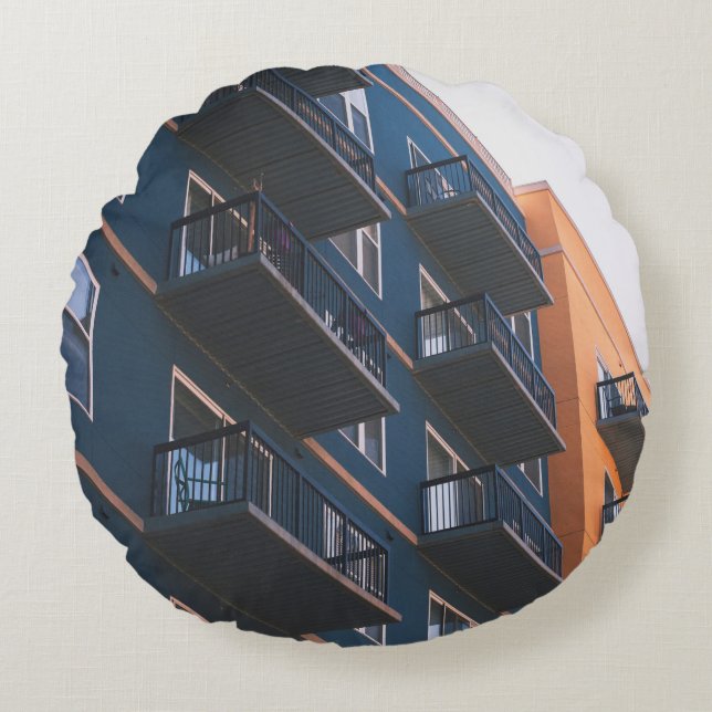 LOW ANGLE VIEW OF BUILDING ROUND CUSHION (Front)