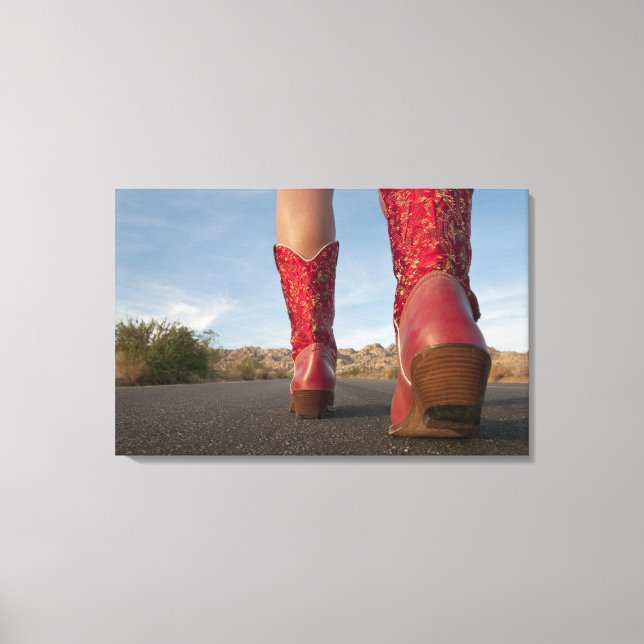 Low-angle view of woman wearing cowboy boots canvas print (Front)